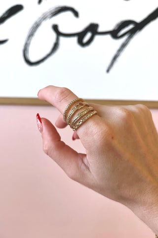 stacked, gold dipped ring, on a hand