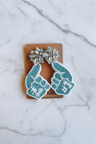 large beaded earrings with a 'foam finger' design for gamedays on a white marble background